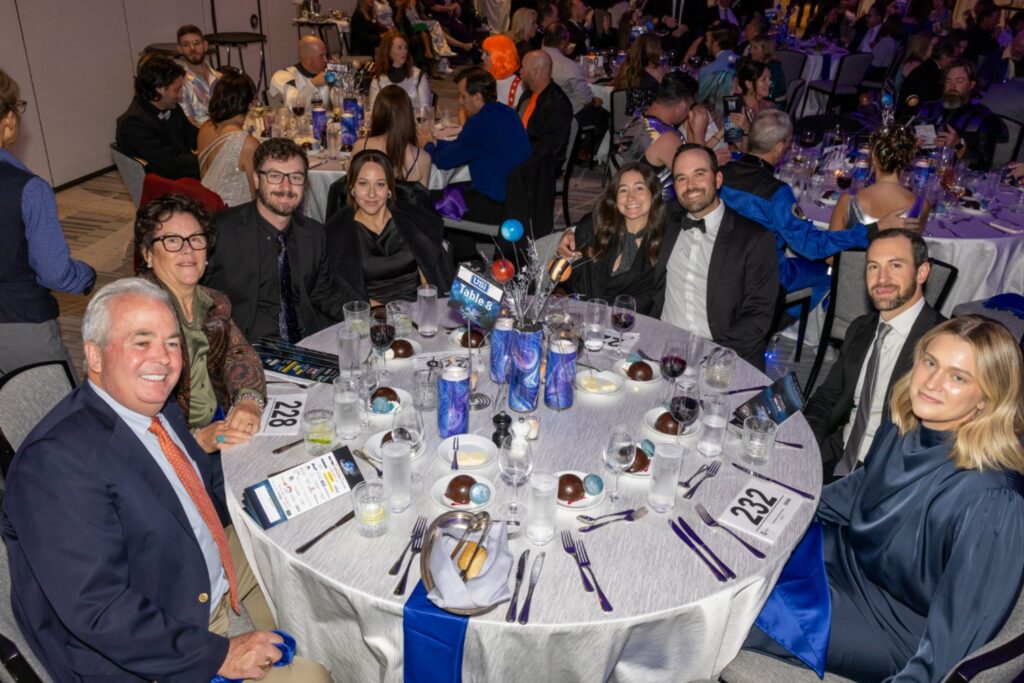 Board Member Preston Pilcher & USI Table