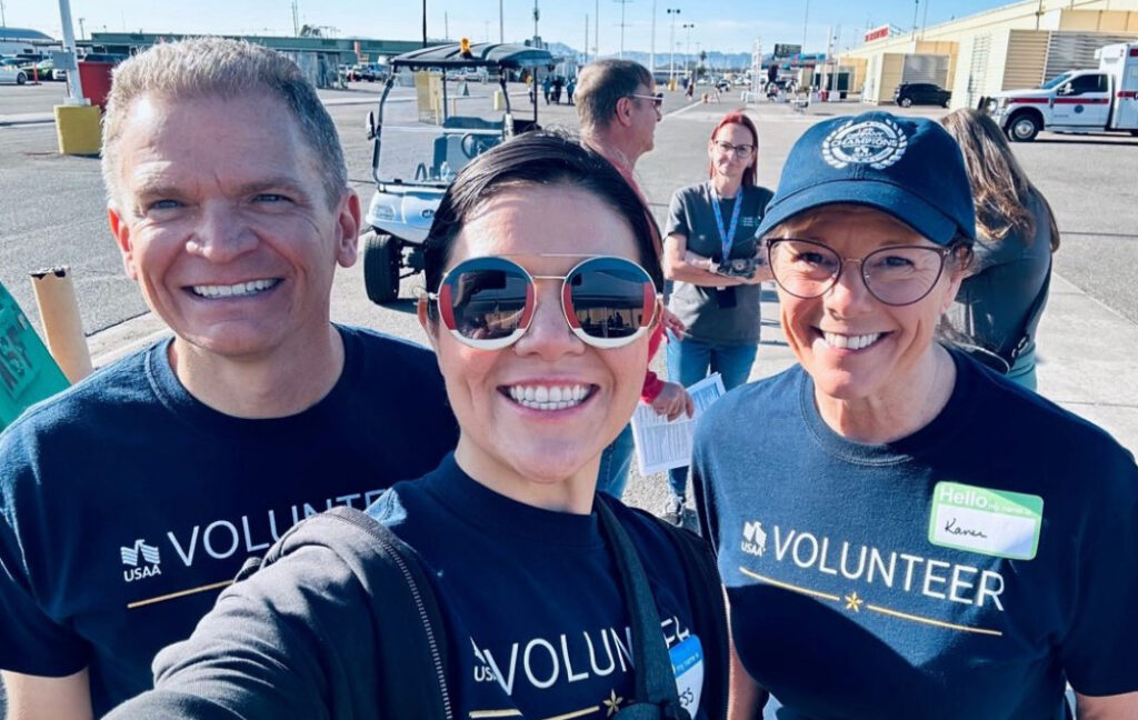 Hanks and USAA executives Brian Kloss and Jess Fadel provide essential services to veterans in need at one of the nation’s largest “Stand Down” events.